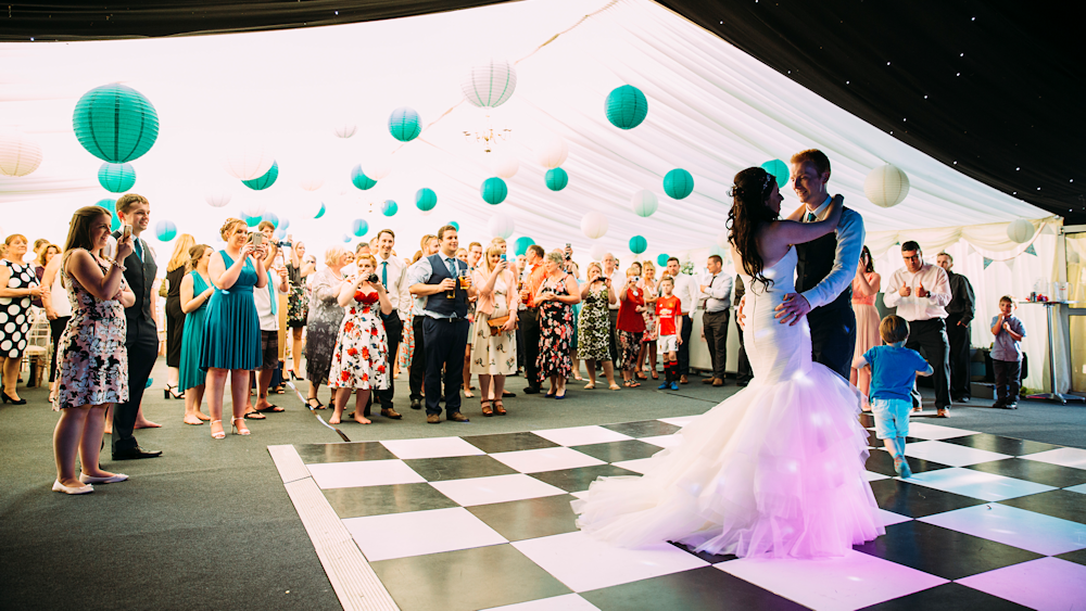 Teal Wedding Lanterns decorate a Waltons Marquee