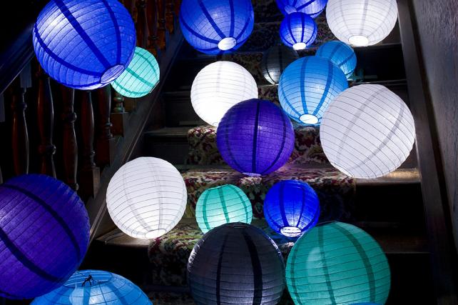 blue, teal and white round paper lanterns