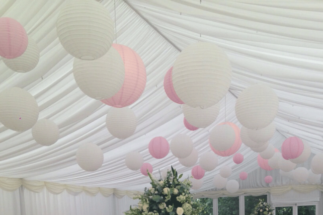 A Pavilion Marquee Decorated with White and Pink Paper Lanterns