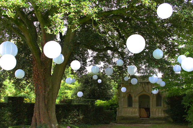 Outdoor white paper lanterns at weddings